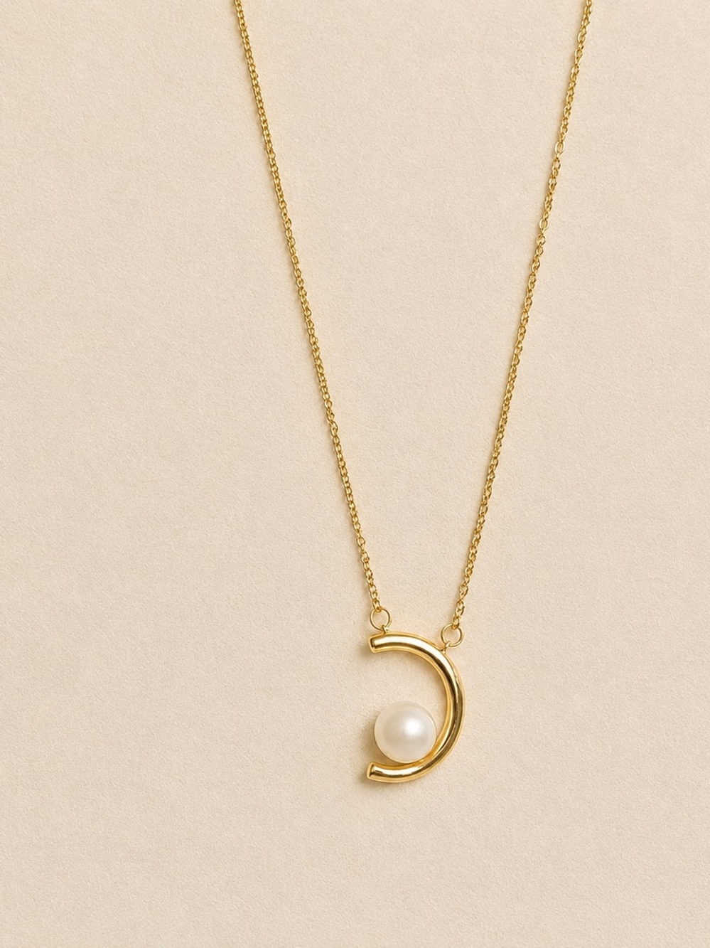 Gold Crescent Necklace with White Pearl Accent